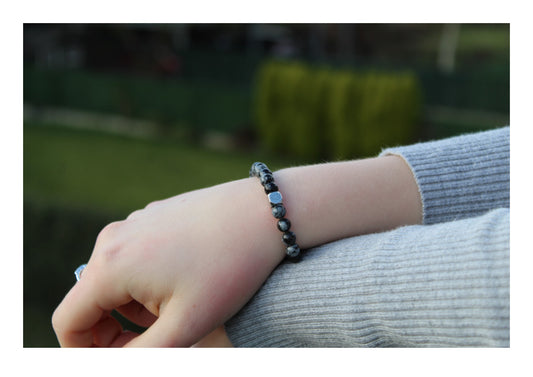 Kogelarmband Pure Stone Osidiaan sneeuwvlok 6mm
